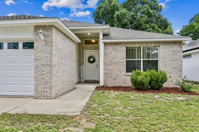 Welcome home to this charming 3-bedroom, 2-bathroom residence - photo 3