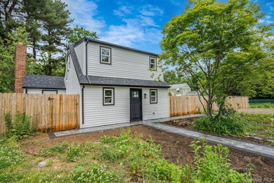 Turnkey Renovated Farmhouse-Style Cape - Elwood School District - photo 2
