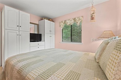 Tucked among mature landscaping in the highly desirable gated - photo 15
