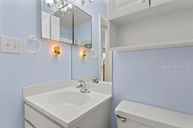 Tucked among mature landscaping in the highly desirable gated - photo 21