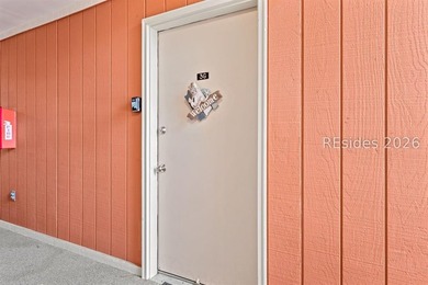 Tucked among mature landscaping in the highly desirable gated - photo 22