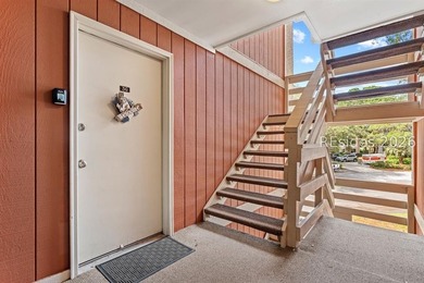 Tucked among mature landscaping in the highly desirable gated - photo 23