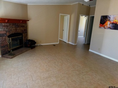 Enjoy a front-row seat to Lake Palestine from this three-bedroom - photo 3