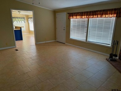 Enjoy a front-row seat to Lake Palestine from this three-bedroom - photo 6