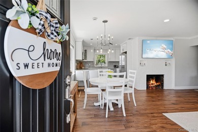 Welcome to this beautifully updated sprawling ranch in the - photo 5