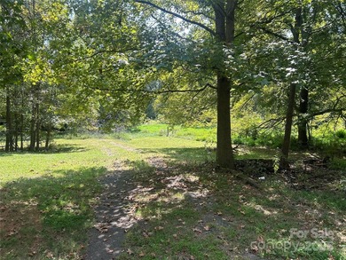 DEVELOPERS DREAM OPPORTUNITY! This 4BR and 2Bath home sits on - photo 4