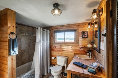 Situated on 3.37 private acres, this unique 4-bedroom, 2-bath - photo 19