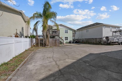 This property sits in the heart of Neptune Beach, one block from - photo 11