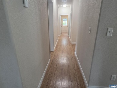 Space and natural light abound in this beautifully maintained - photo 14
