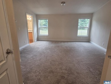 Space and natural light abound in this beautifully maintained - photo 15