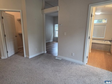Space and natural light abound in this beautifully maintained - photo 17