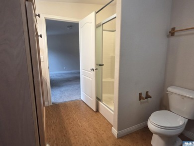 Space and natural light abound in this beautifully maintained - photo 19