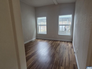 Space and natural light abound in this beautifully maintained - photo 20