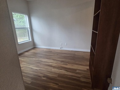Space and natural light abound in this beautifully maintained - photo 21