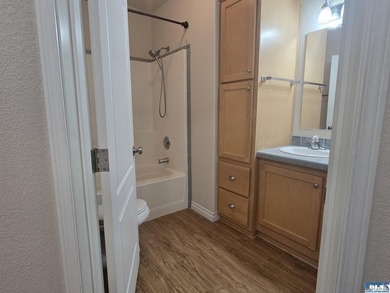 Space and natural light abound in this beautifully maintained - photo 22