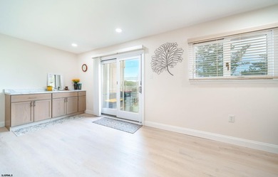 Welcome to 18 Empire Drive in the Bay Club Condominiums!