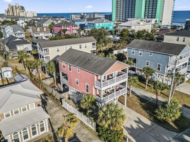 Step into coastal paradise with this exquisite 5-bedroom, 5