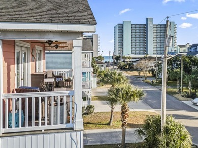 Step into coastal paradise with this exquisite 5-bedroom, 5