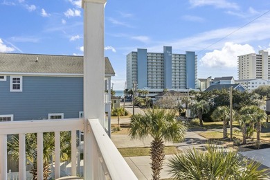 Step into coastal paradise with this exquisite 5-bedroom, 5