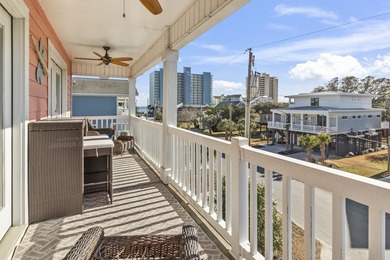 Step into coastal paradise with this exquisite 5-bedroom, 5