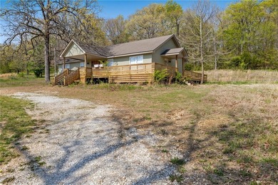 Charming 3-Bedroom home on 3 Acres - Lake Sequoyah Area! Nestled - photo 2