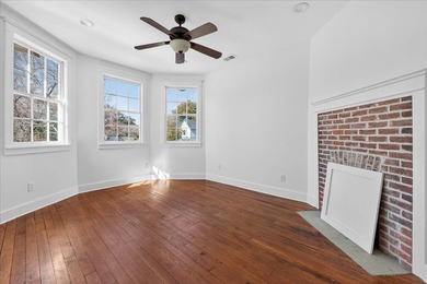 This beautifully renovated historic duplex features two units - photo 2