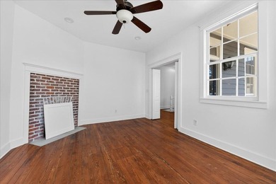 This beautifully renovated historic duplex features two units - photo 3