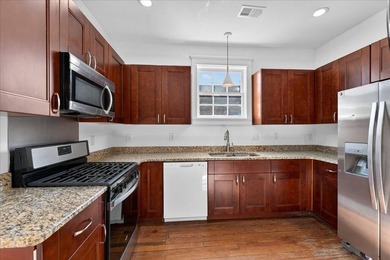 This beautifully renovated historic duplex features two units - photo 7