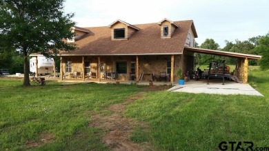 Custom home on over 28 acres of heaven.  There is an abundance - Lake Home For Sale in Omaha, Texas