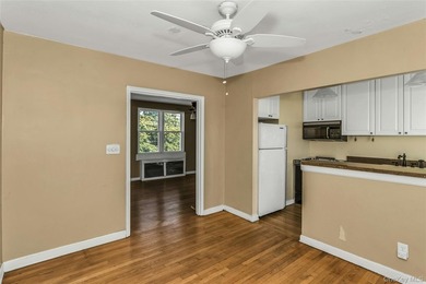 Welcome to the top floor corner unit two-bedroom, one bath co-op - photo 10