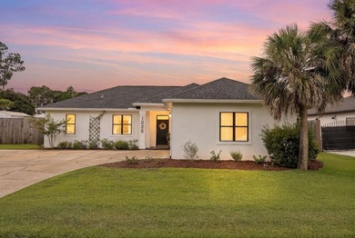 Discover coastal living in this 3-bedroom, 2-bath ranch-style - photo 1