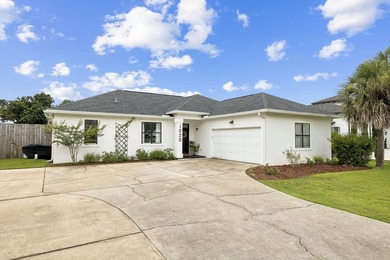 Discover coastal living in this 3-bedroom, 2-bath ranch-style - photo 2