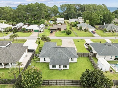 Discover coastal living in this 3-bedroom, 2-bath ranch-style - photo 5