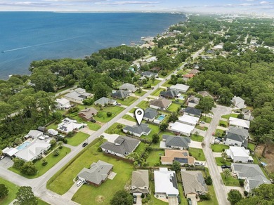 Discover coastal living in this 3-bedroom, 2-bath ranch-style - photo 6