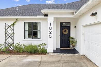 Discover coastal living in this 3-bedroom, 2-bath ranch-style - photo 7