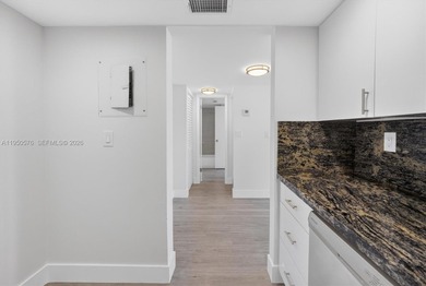 This beautifully and completely updated top floor, split bedroom