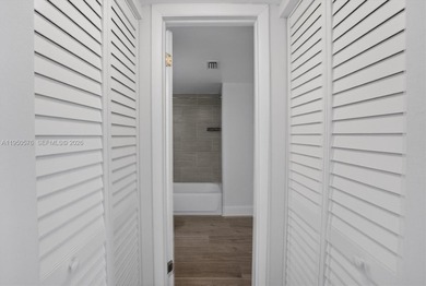 This beautifully and completely updated top floor, split bedroom