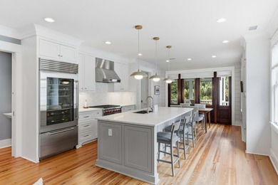 This move-in ready top-floor condominium sits on one of South of - photo 6