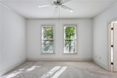 Welcome to this charming, light-filled condominium conveniently