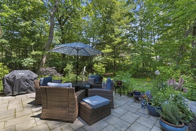 Set on a beautiful tree-lined street in Alden's Walk, this - photo 13