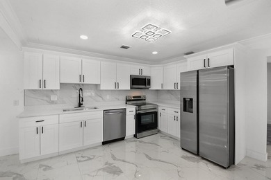 Fully renovated 3-bedroom, 2-bath home featuring a desirable - photo 14
