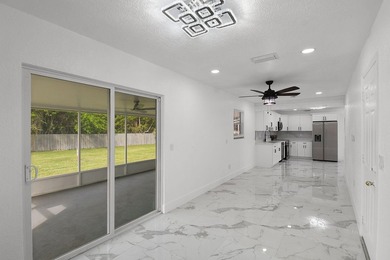 Fully renovated 3-bedroom, 2-bath home featuring a desirable - photo 17