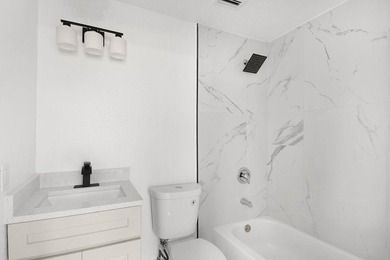 Fully renovated 3-bedroom, 2-bath home featuring a desirable - photo 19