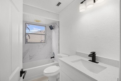 Fully renovated 3-bedroom, 2-bath home featuring a desirable - photo 26