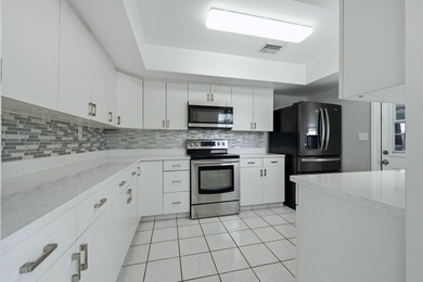 Lakefront living at its finest! Enjoy breathtaking panoramic - photo 12