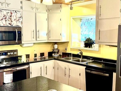 WATERFRONT! Tucked within a peaceful cove, this home is made for - photo 4