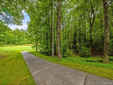 This .75 acre gently sloping golf course lot overlooks #3 green - photo 6