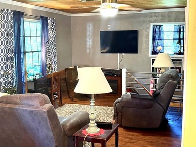 WATERFRONT! Tucked within a peaceful cove, this home is made for - photo 7