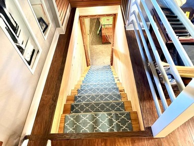 WATERFRONT! Tucked within a peaceful cove, this home is made for - photo 9