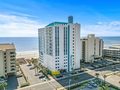 Welcome to this beautifully updated, fully furnished top-floor - photo 1